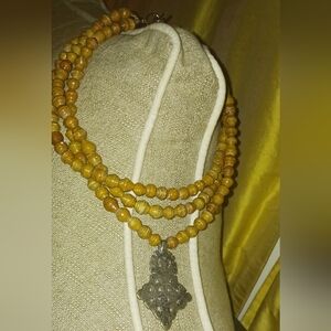 Cool handmade 3 strand beaded necklace with a brass accent medallion